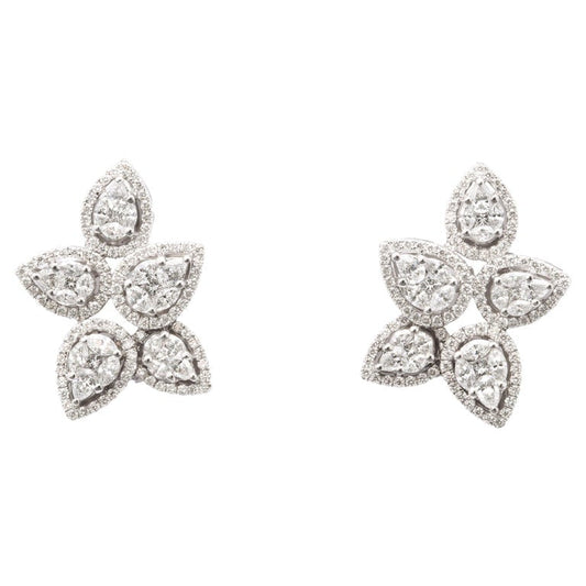 https://a.1stdibscdn.com/diamond-cluster-earrings-for-sale/j_415/j_140275121637952988477/j_14027512_1637952989428_bg_processed.jpg?width=768