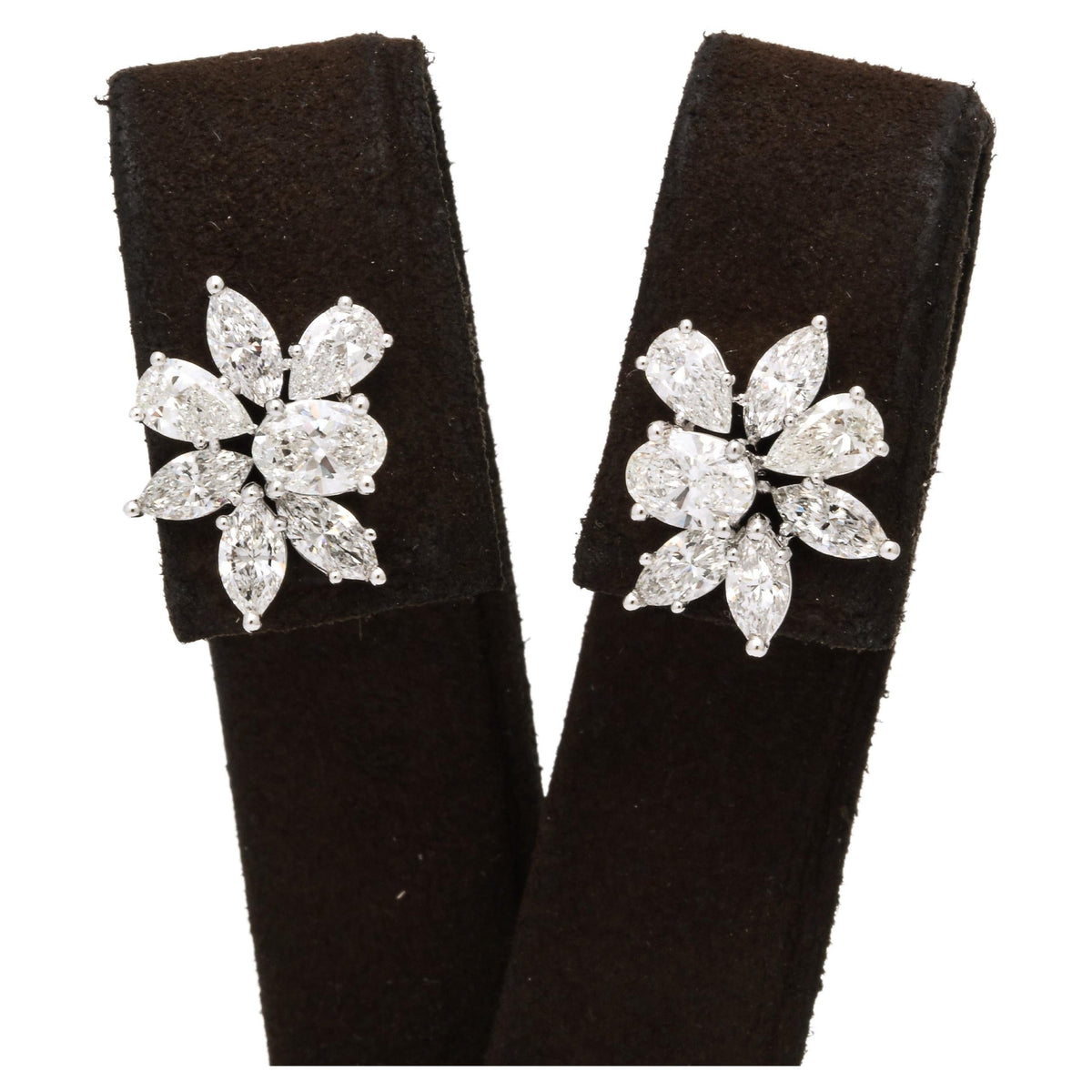 https://a.1stdibscdn.com/diamond-cluster-earrings-for-sale/j_415/j_141445021639062275454/j_14144502_1639062276697_bg_processed.jpg