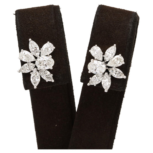 https://a.1stdibscdn.com/diamond-cluster-earrings-for-sale/j_415/j_141445021639062275454/j_14144502_1639062276697_bg_processed.jpg