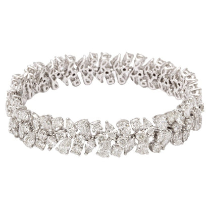 https://a.1stdibscdn.com/diamond-bracelet-for-sale/j_415/j_161980821655913468829/j_16198082_1655913470069_bg_processed.jpg?width=768