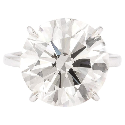 https://a.1stdibscdn.com/11-carat-round-diamond-engagement-ring-for-sale/j_415/j_165034421658770667824/j_16503442_1658770668386_bg_processed.jpg?width=768