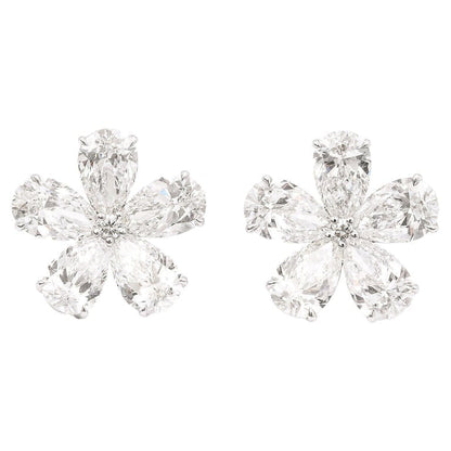https://a.1stdibscdn.com/diamond-flower-earrings-for-sale/j_415/j_169630021663010258818/j_16963002_1663010259525_bg_processed.jpg?width=768