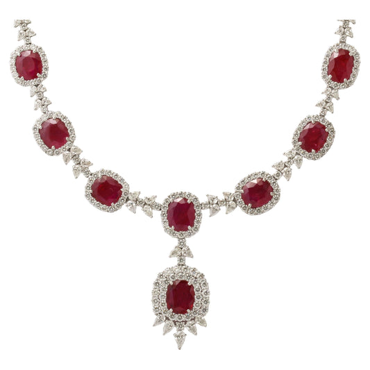 https://a.1stdibscdn.com/ruby-and-diamond-drop-necklace-for-sale/j_415/j_183836821675872219343/j_18383682_1675872220595_bg_processed.jpg