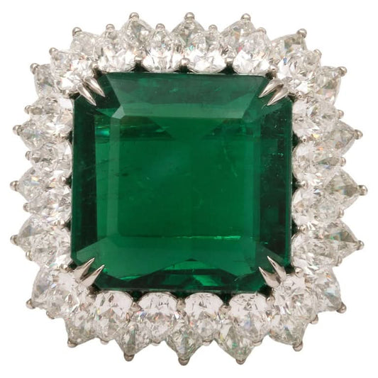 https://a.1stdibscdn.com/13-carat-emerald-and-diamond-ring-for-sale/j_415/j_203160921694195622762/j_20316092_1694195623624_bg_processed.jpg?width=768